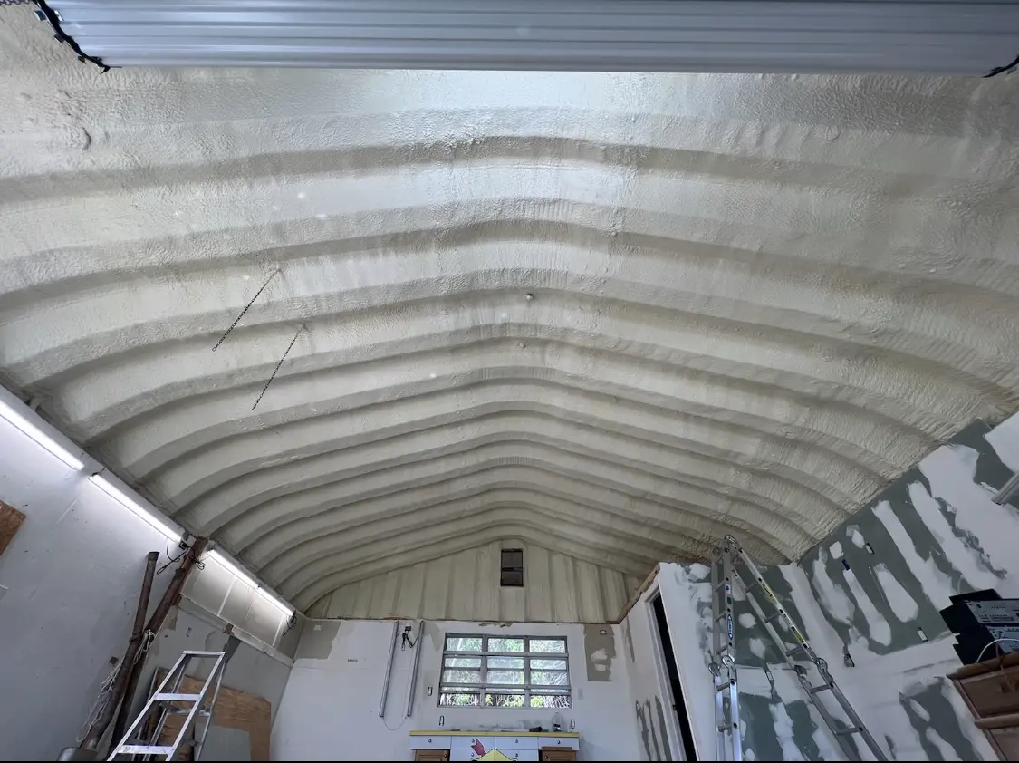 Spray polyurethane foam applied to the underside of a metal roof deck in Nocatee